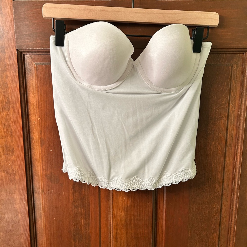 JEZEBEL White strapless corset with adjustable hook and eye closure. Size 36B